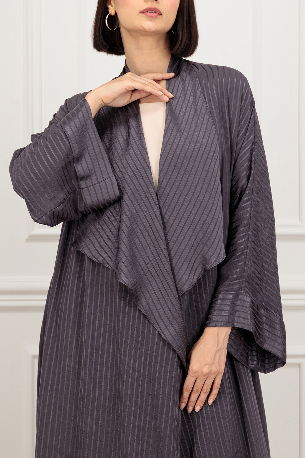 Effa’s signature loose cut Abaya with a wide collar
