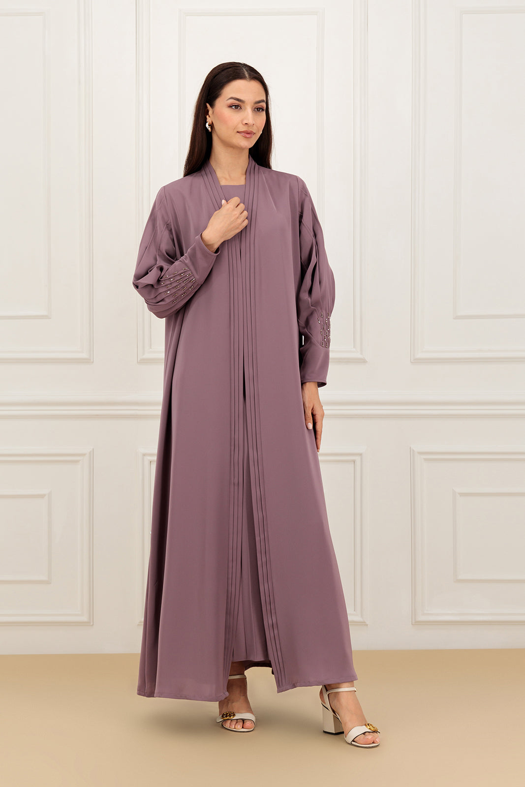 Pleated sleeves with embelishment
