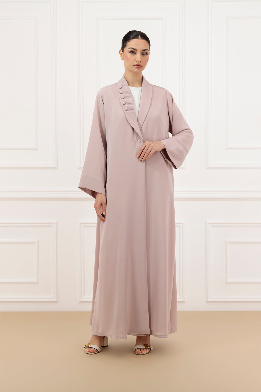 Asymmetrical pleated shawl collar with cover buttons