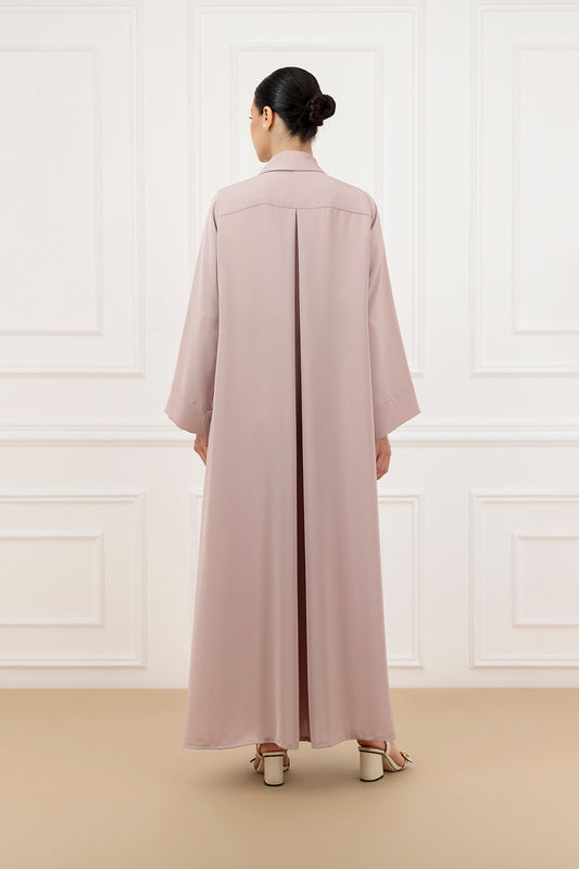 Asymmetrical pleated shawl collar with cover buttons