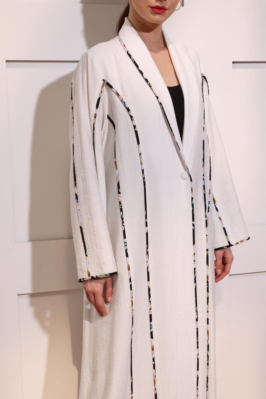 White linen abaya with floral piping