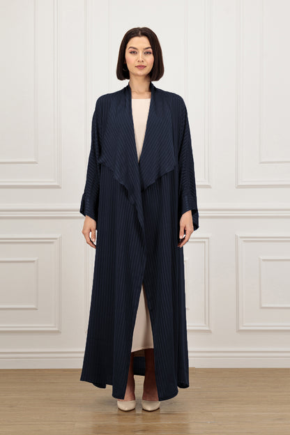 Effa’s signature loose cut Abaya with a wide collar