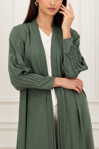 Pleated sleeves with embelishment