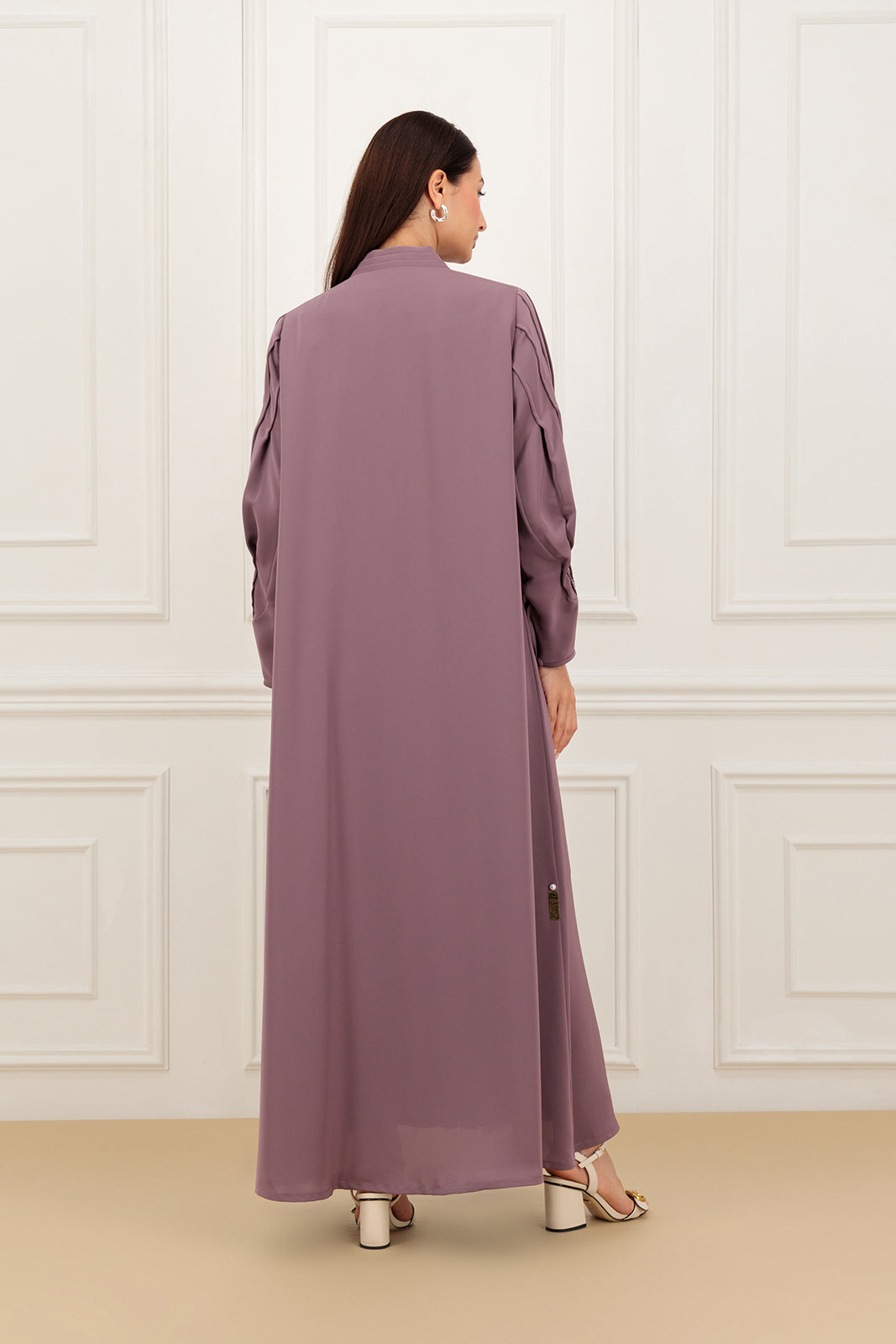 Pleated sleeves with embelishment