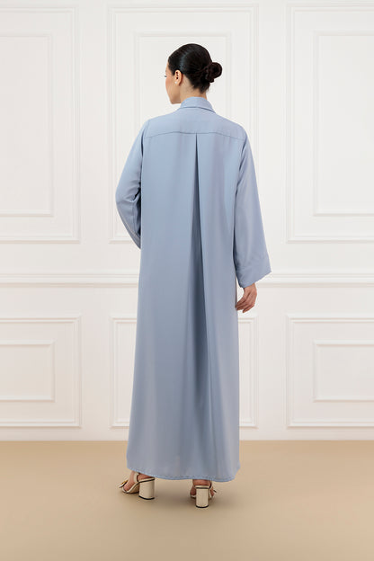 Asymmetrical pleated shawl collar with cover buttons