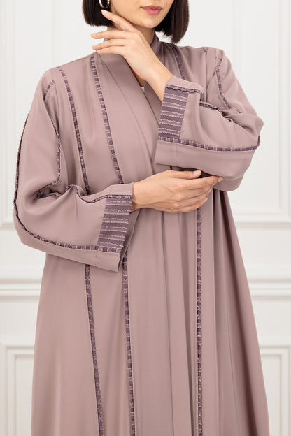 Abaya with textured piping on the front and sleeves